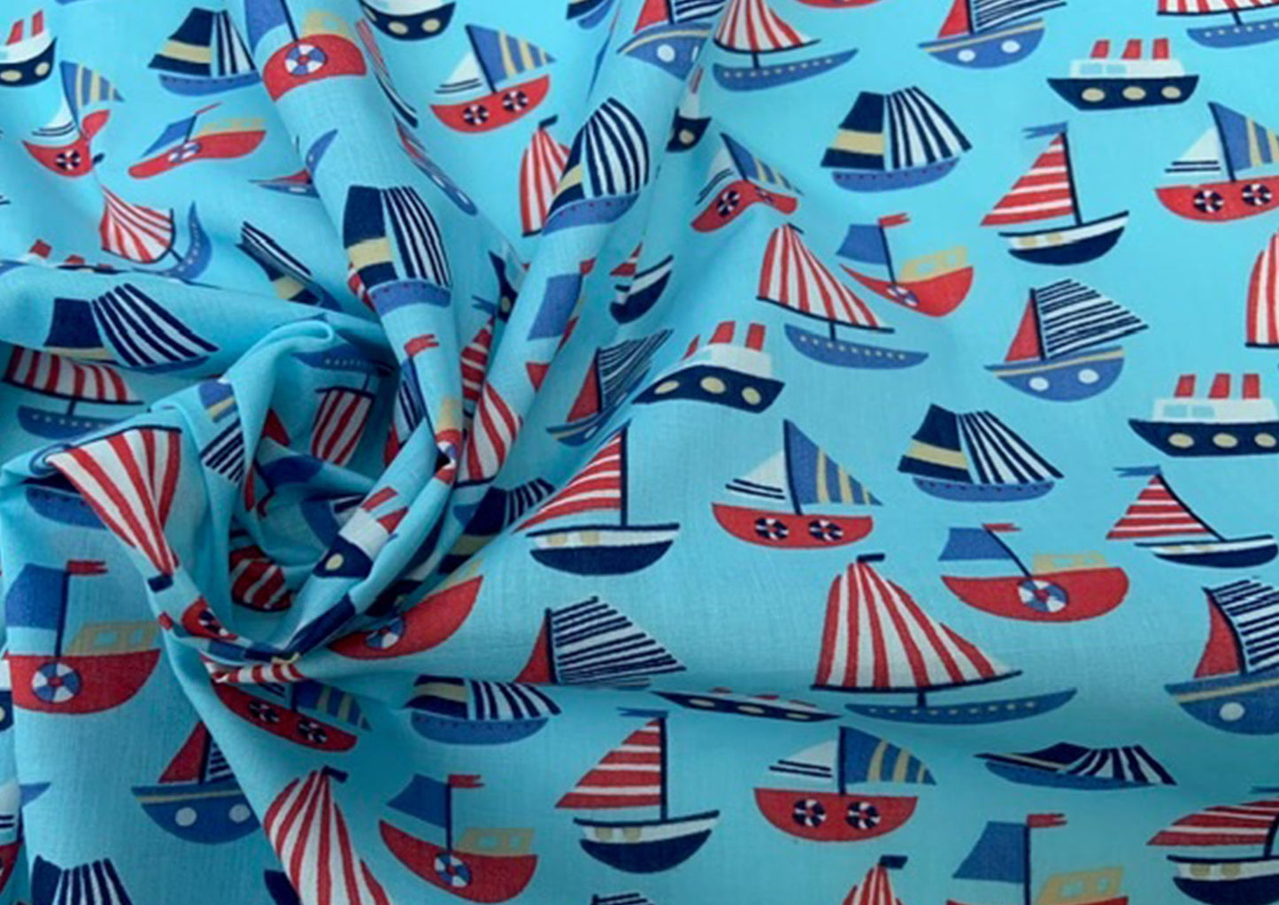 Boats on blue polycotton print