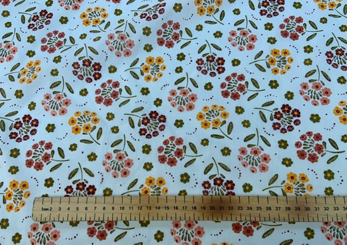 Floral polycotton print, brown and mustard on white