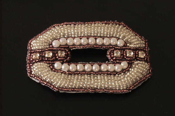 Decorative iron-on belt buckle motif