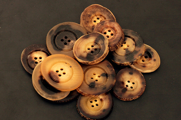 Light genuine horn buttons