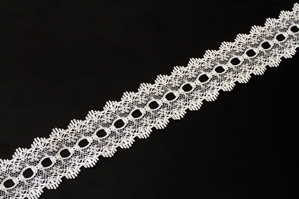 Knitting in eyelet lace, various colours