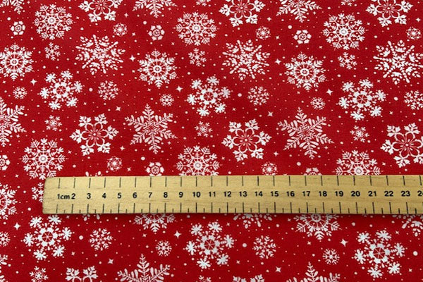 Christmas polycotton, white snowflake on red
