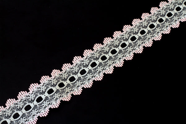 Knitting in eyelet lace, various colours