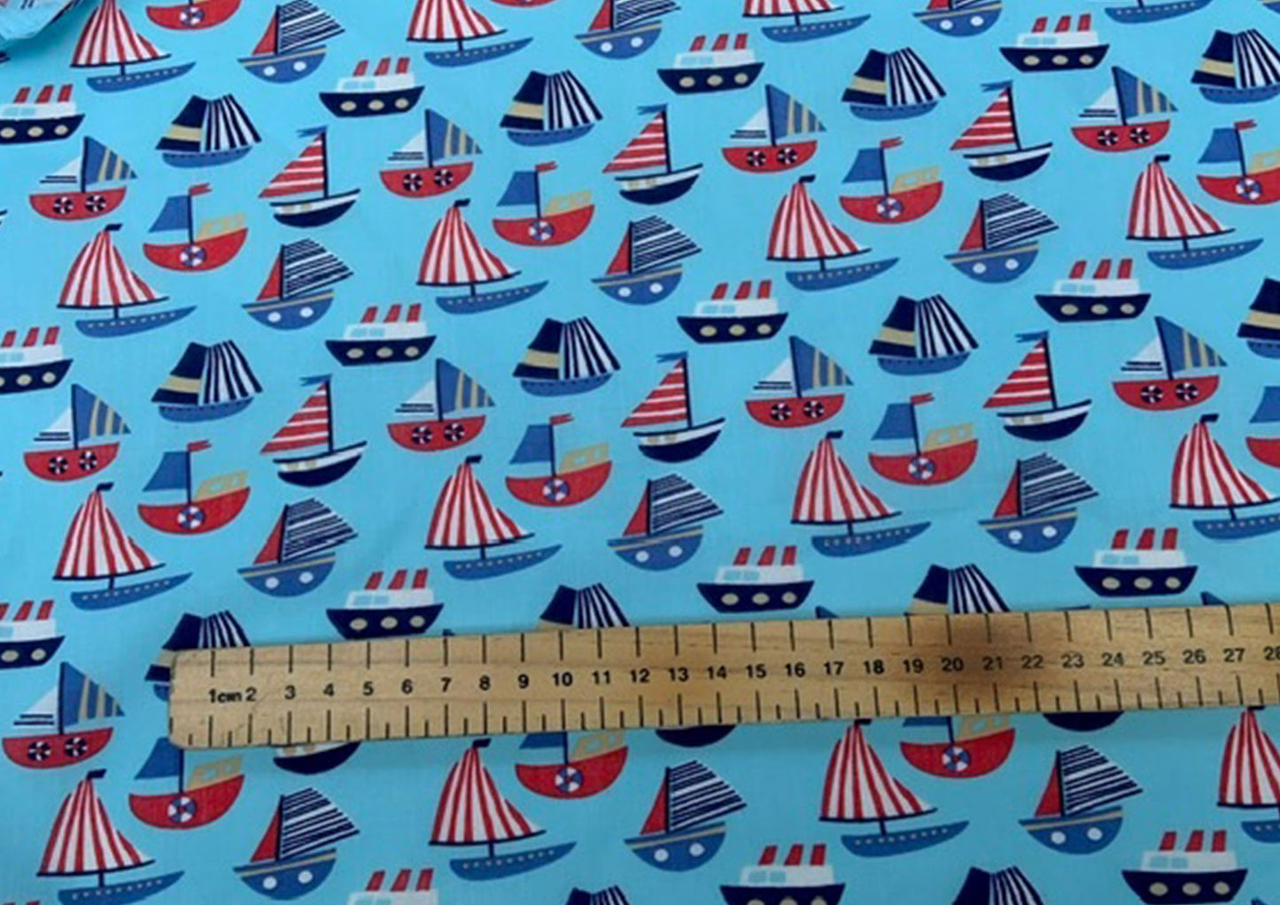 Boats on blue polycotton print