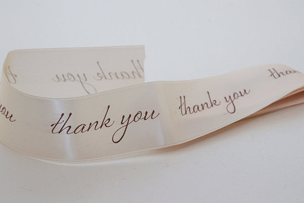 Cream “thank you” ribbon