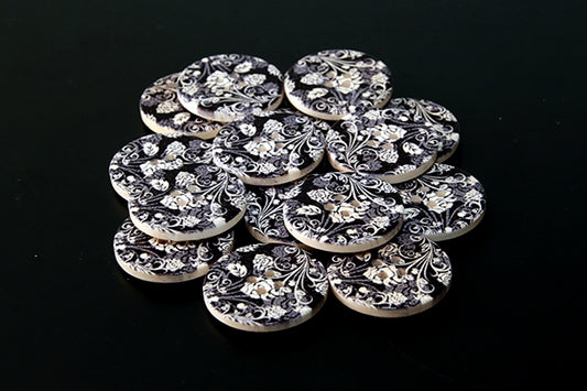 Wooden buttons with black and white pattern