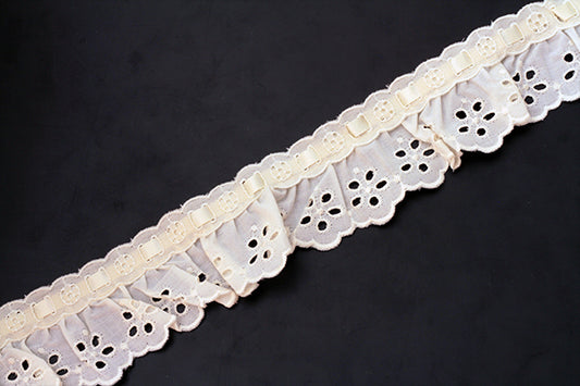 Cream gathered broderie anglaise