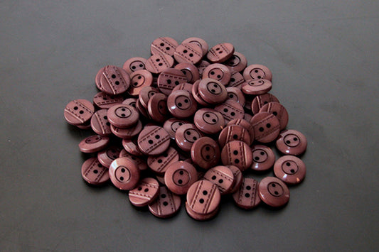 Brown wooden buttons with stitch groove