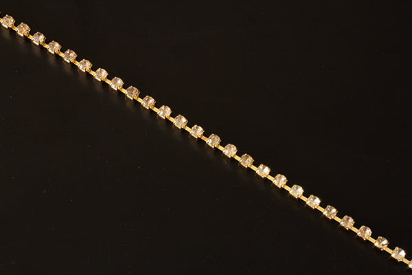 Gold and diamante stud chain