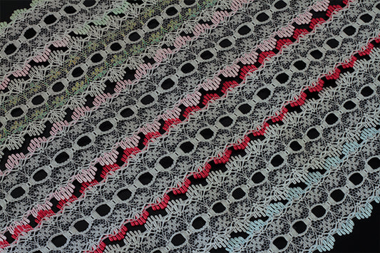 Knitting in eyelet lace, various colours