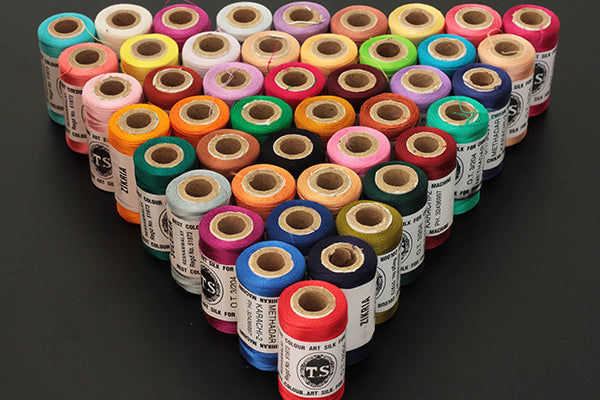 Machine embroidery threads - 500 metres per spool, coloured