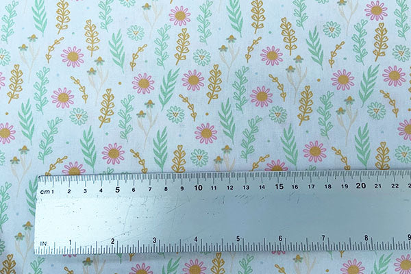 Orange and green floral on white background 100% cotton print