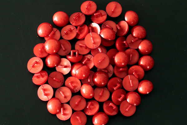 Orangey-red round shank button, 14mm