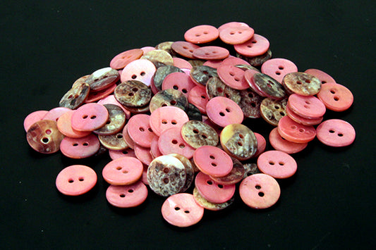 Round pink mother of pearl buttons