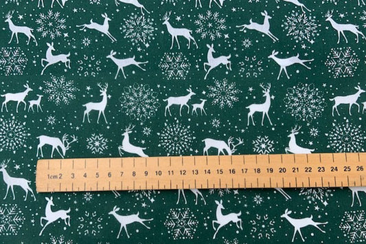 Christmas polycotton, white stags on green