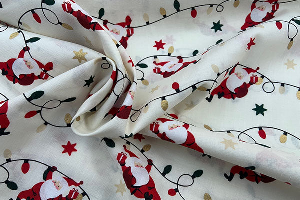 Santa on ivory, Rose & Hubble 100% cotton print