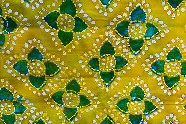 Yellow batik print with green flower