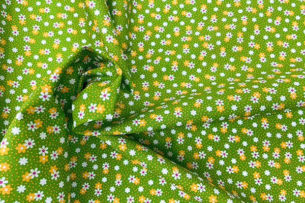 Yellow flowers on lime background, 100% cotton print